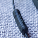 QC30 inline controller, volume/music controls (left) and noise-canceling controls (right)